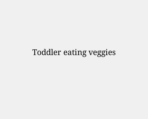 Toddler eating veggies